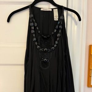 tunic blouse with black gemstone detailing
